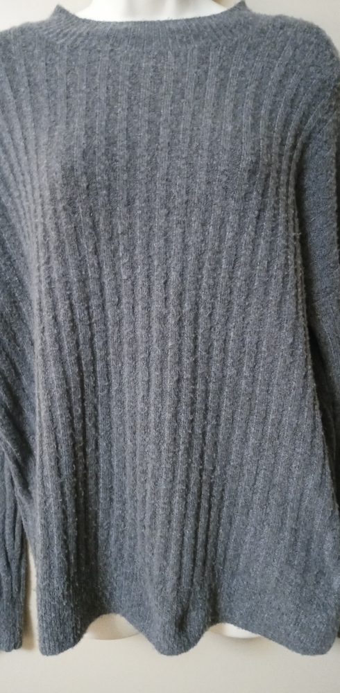 Comfy and warm gray cable sweater. Stretchy and soft. Cute lacing in the back.